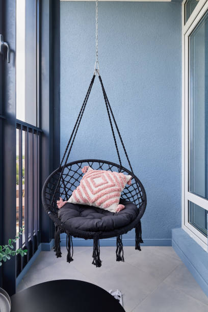 istock A Stylish and Comfortable Hanging Chair Beautifully Positioned on a Modern Balcony Space 2192074647
