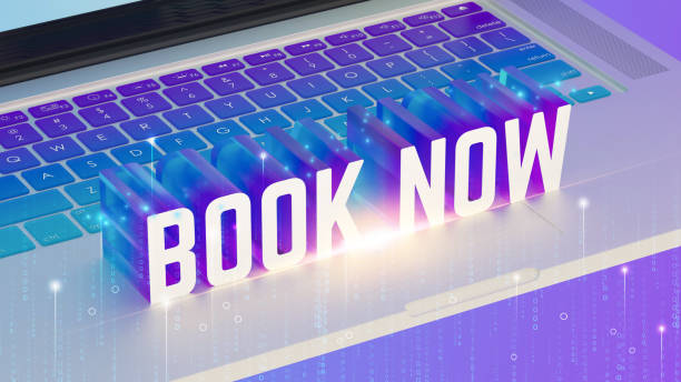 istock Laptop keyboard, vibrant purple and blue gradient, glowing BOOK NOW 3D text, digital particles, binary code background, neon lights, holographic effect, high-tech aesthetics, online booking concept, 3D render. 2192074717