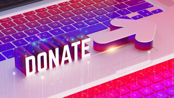 Colorful keyboard, 3D DONATE text, glowing arrow, digital stream, neon lights, purple and pink gradient, binary code overlay, online donation concept, futuristic design, high-resolution render, 3D render.