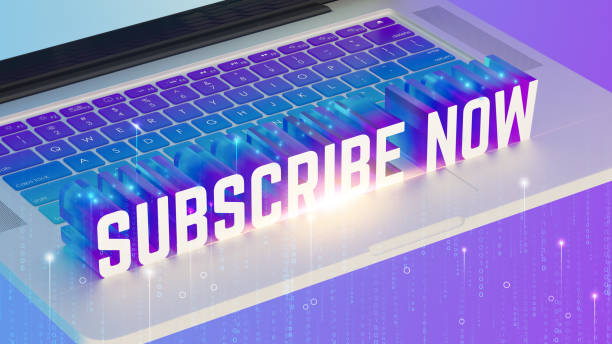 istock Laptop keyboard, vibrant purple and blue gradient, glowing SUBSCRIBE NOW text, holographic effect, digital matrix background, high-contrast lighting, isometric view, content creation concept 2192075686
