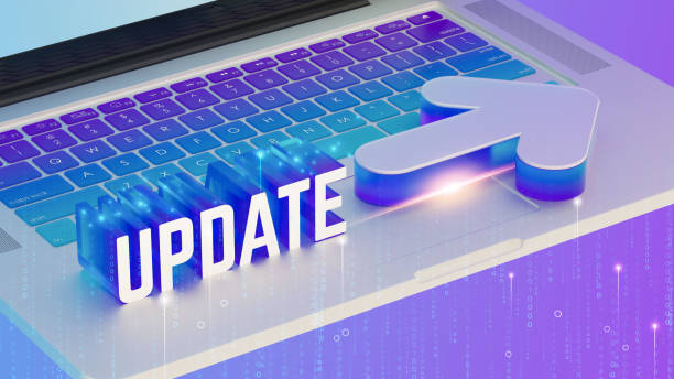 istock 3D render, laptop keyboard, glowing purple and blue gradient, UPDATE text in bold white, futuristic arrow icon, digital binary code, holographic effect, high-tech, 8K resolution. 2192075902