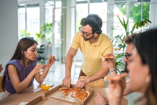 istock Inclusive Team Lunch with Diverse Office Colleagues 2192077790