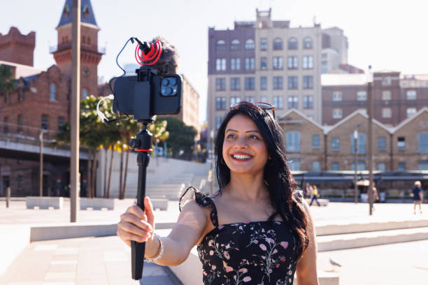 istock Female Indian travel influencer recording content 2192079151