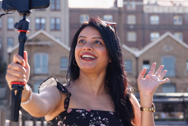 istock Female Indian travel influencer recording content 2192079161