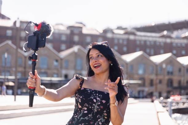 istock Female Indian travel influencer recording content 2192079175