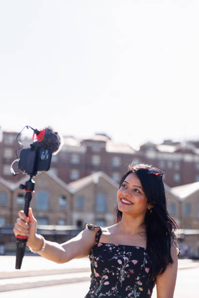 istock Female Indian travel influencer recording content 2192079176