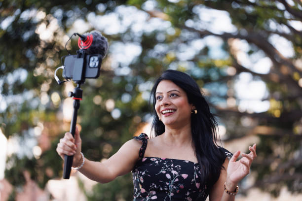 istock Female Indian travel influencer recording content 2192079337