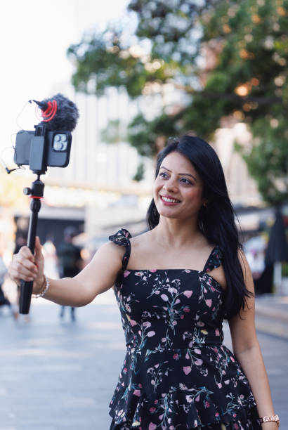 istock Female Indian travel influencer recording content 2192079848