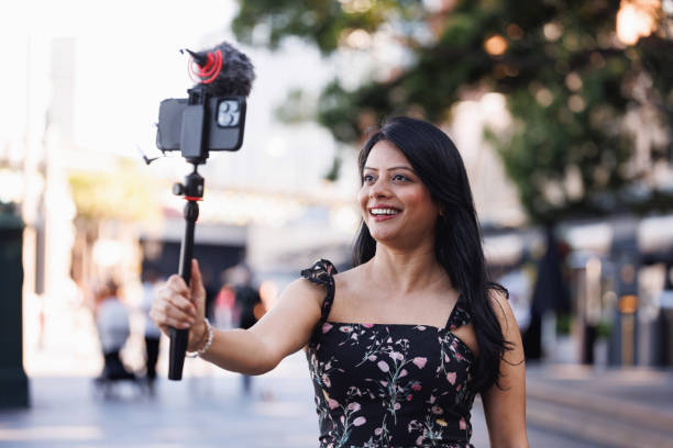 istock Female Indian travel influencer recording content 2192079849