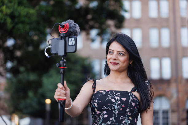 istock Female Indian travel influencer recording content 2192079865