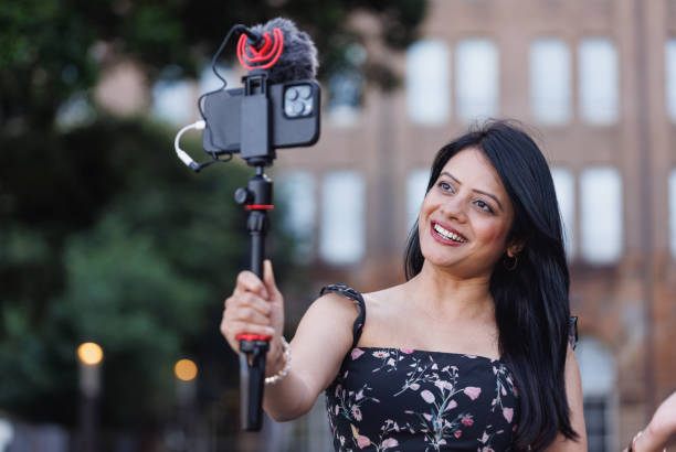 istock Female Indian travel influencer recording content 2192079870