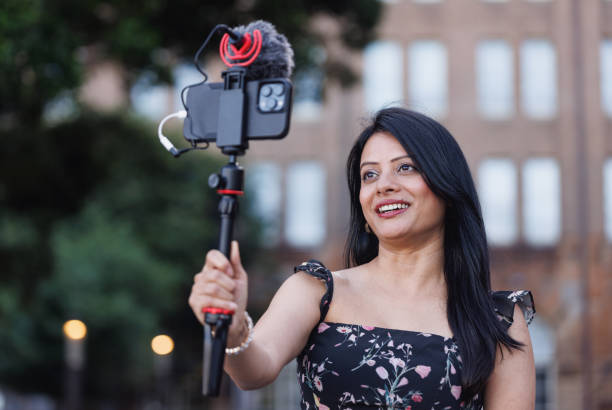 istock Female Indian travel influencer recording content 2192079872