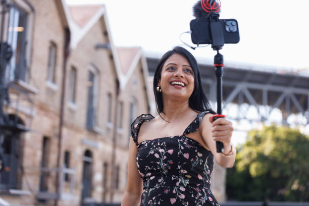 istock Female Indian travel influencer recording content 2192079934