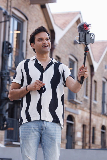 istock Male Indian travel influencer recording content 2192079963