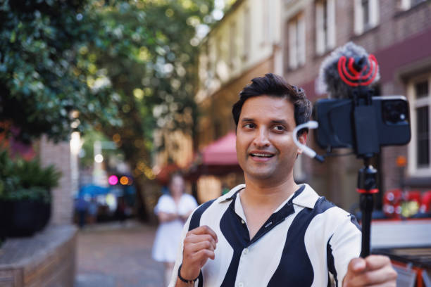 istock Male Indian travel influencer recording content 2192080043