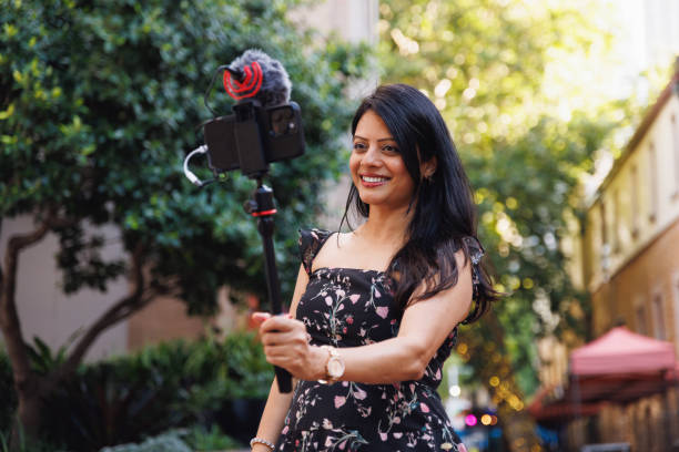 istock Female Indian travel influencer recording content 2192080146