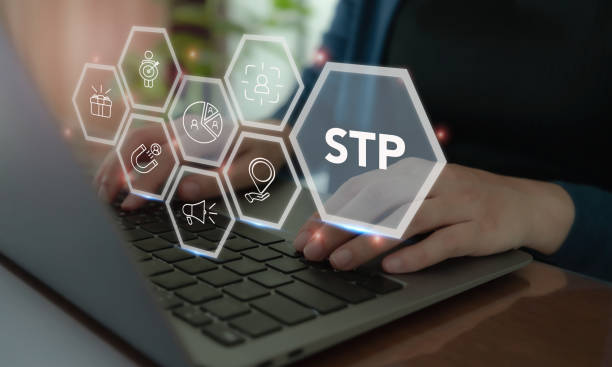 istock Segmentaion, targeting, positioning 
STP Marketing Model. Working on laptop with STP icon. Identify different customer groups, select groups to prioritize, and create brandâs unique value proposition. 2192080998