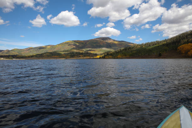 istock Paddleboarding during fall colors at Pearl Lake Colorado 2192085863