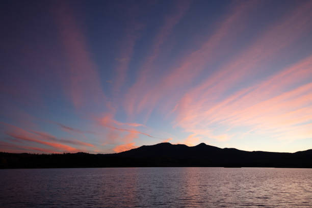 Sunset with pink clouds over Steamboat Lake Colorado