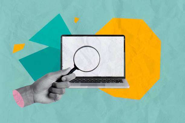 istock Collage of exploration hand holding magnifying glass over blank laptop screen creative workspace digital environment close-up view innovation 2192087726