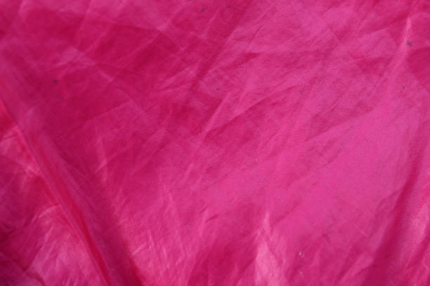 istock pink satin fabric texture and background with irregular wrinkled pattern 2192092895