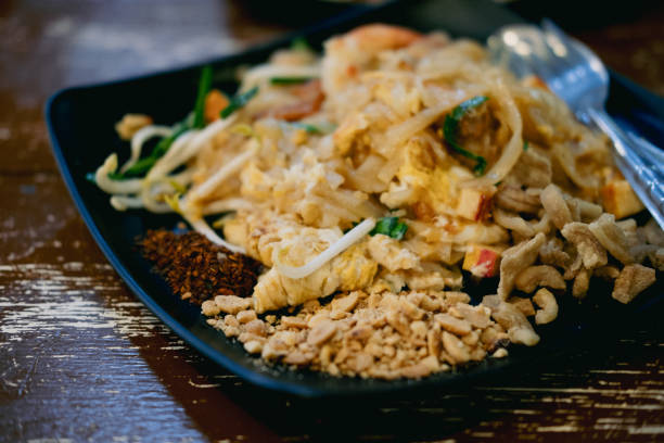istock Pad Thai noodle with tofu, egg and peanut and mixed vegetable. 2192095712