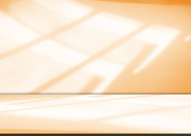 istock Orange background beige studio room abstract shadow on wall floor blur cement, podium minimal cosmetic presentation, cement empty backdrop platform stage table loft scene mockup podium plant. 2192097326