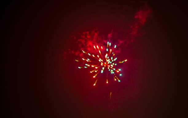 istock Fireworks exploding colorful in a dark night sky to celebrate New Year, Almere, Flevoland, Netherlands 2192099709