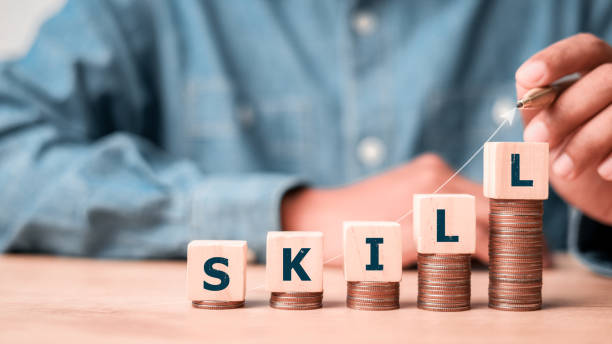istock skills icon on wooden cube. Upskilling and personal development concept. Skill training, education, learning, ability. Upskilling, reskilling, 2192100823