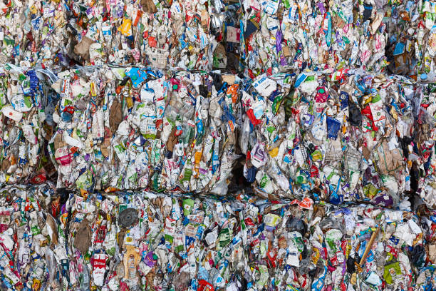 istock Recycled and packaged waste. Sustainable industry. Reusable material 2192100856