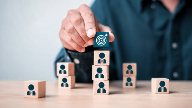 istock leader and followers pointing. human icon for customer focus target group and customer relation management concept. 2192100862