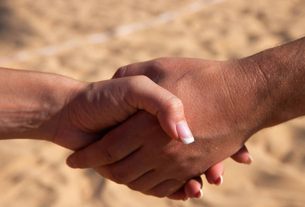 Closeup shot of two people shaking hands