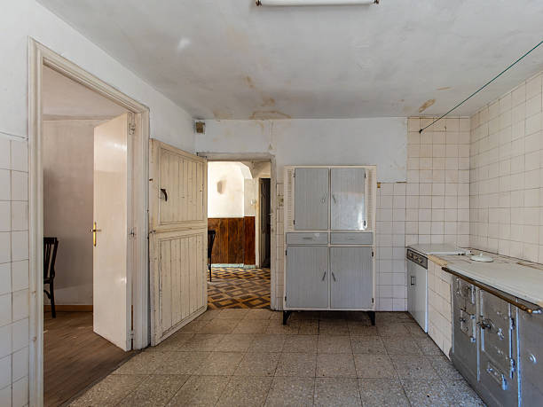 istock Old damaged kitchen showing neglect and decaying interior 2192106554