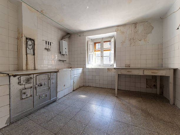 istock Old abandoned kitchen showing deterioration and neglect 2192106559