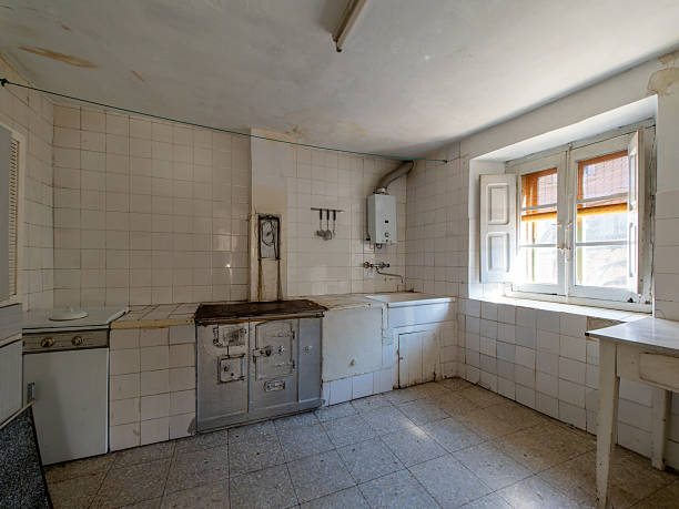 istock Old, uninhabited kitchen showing signs of decay and neglect 2192106636