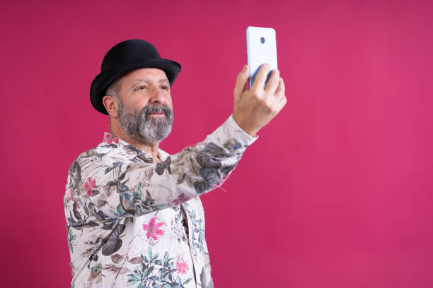 istock A man is taking a picture of himself with a cell phone 2192106734