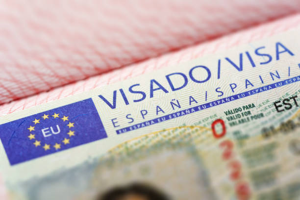 istock Spanish visa in passport close-up. 2192111395