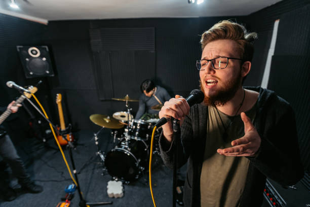 istock Rock Band Rehearsing In A Studio 2192112024
