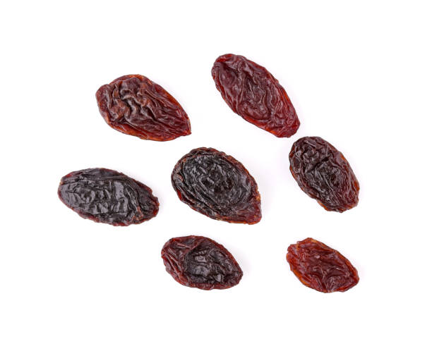 istock Top view of dried raisins isolated on white background. 2192127672