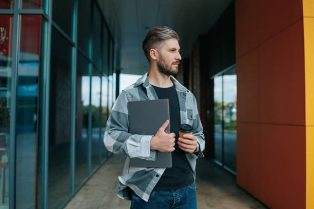 istock Caucasian Worker Confidence Posing with Laptop in the City 2192131779