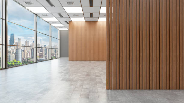 istock Modern Empty Office Space with City View and Wooden Wall Panels 2192133490