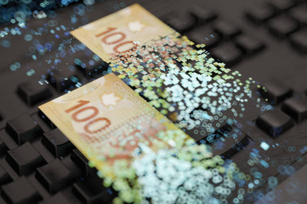 istock Online Digital Money Transfer Concept with Canadian Dollars and Computer Keyboard 2192133653