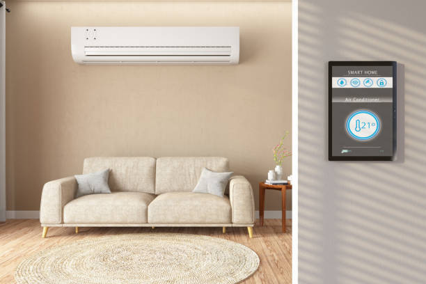 Smart Home Controller on Modern Living Room's Wall. Air Conditioner Remote