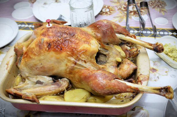 A delicious roast turkey with potatoes on the table for a Christmas party