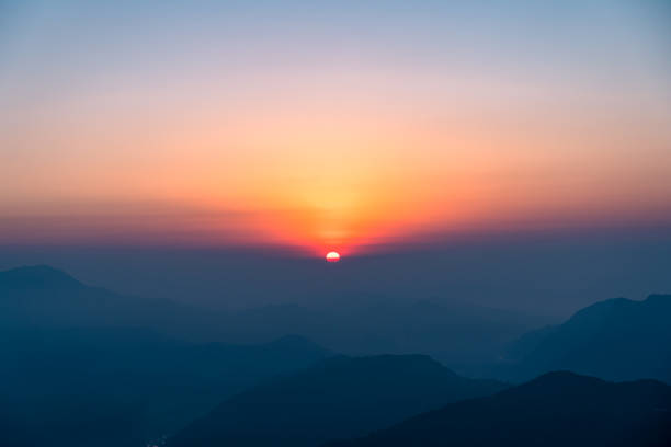 istock Gloomy Sunrise over the Mountain 2192136999