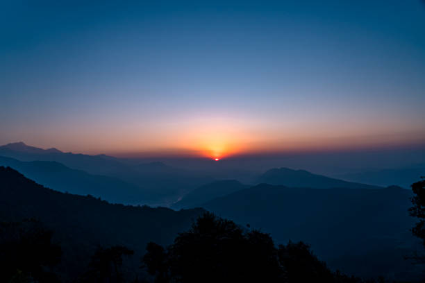istock Gloomy Sunrise over the Mountain 2192137001