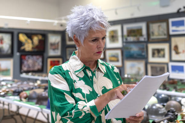 istock Confident Woman Reviewing Notes in a Portrait 2192138515
