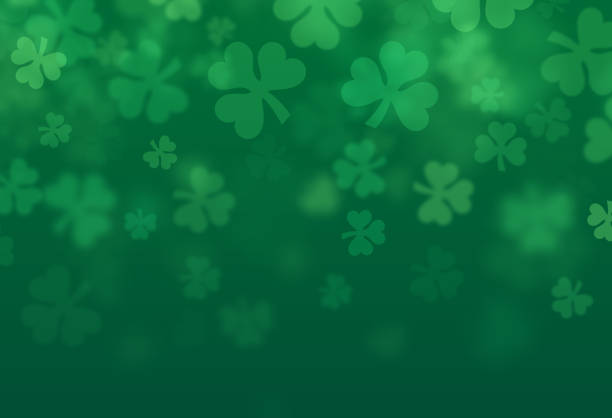 St. Patrick's Day Lucky Shamrock Green Abstract Glow Background Pattern St. Patrick's Day shamrock abstract green glow background pattern. clover stock illustrations