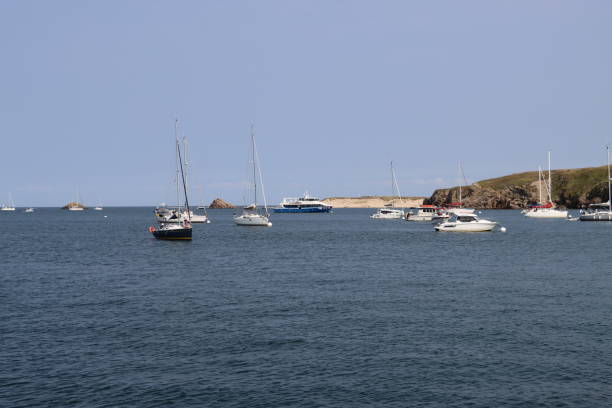 On August 19th 2024 , Houat island in Brittany, France. During summer holidays in France tourists come by boat to visit this beautiful island in Morbihan department.