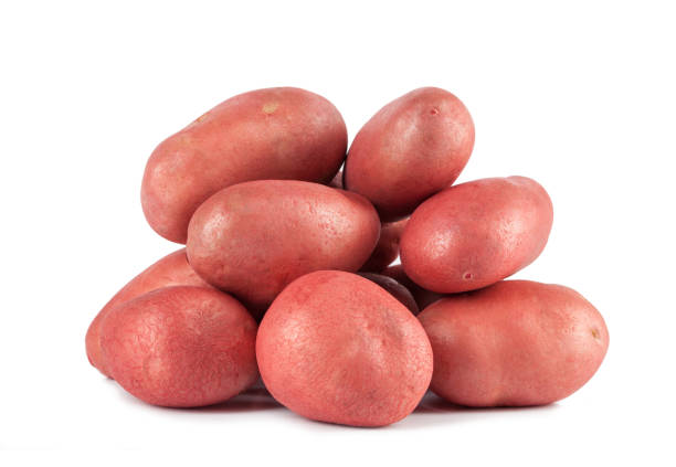 pile of potatoes on white background